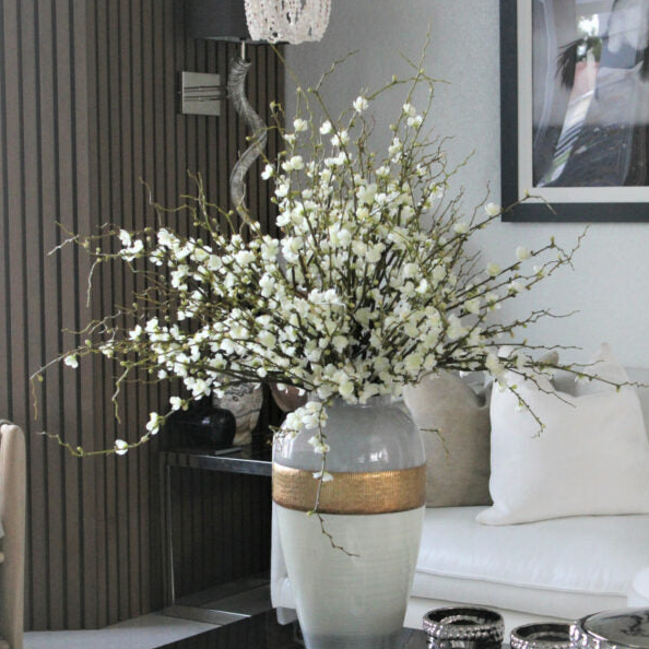 Goddess Vase with Cherry Blossom Branches.