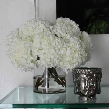White Hydrangea Bouquet in clear glass cylinder vase